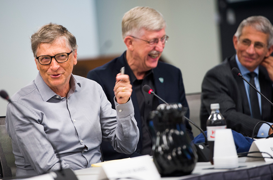 Photo of Bill Gates laughing with Anthony Fauci and NIH director Francis Collins in 2017.