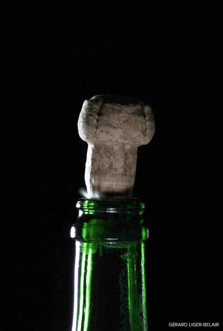 A short movie of a cork popping off a champagne bottle.
