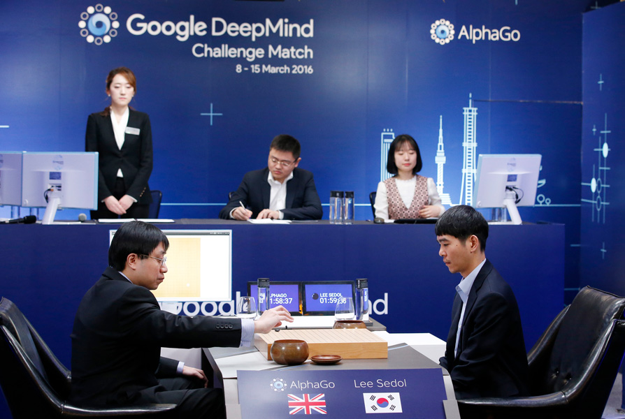Photo shows a champion Go player in a contest with Google’s DeepMind computer, facilitated by the computer’s lead programmer, in a game of Go in Seoul, South Korea in 2016.