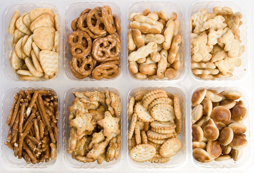 Photo shows a selection of crackers, considered low-moisture foods.