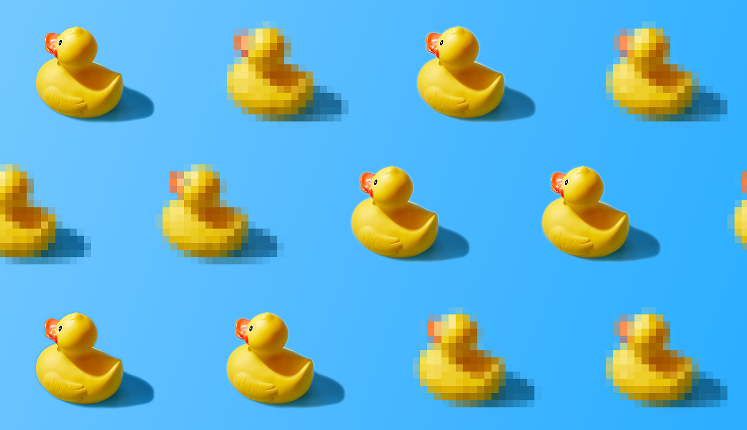 Rows of yellow rubber ducks, some blurred with blocky pixels.