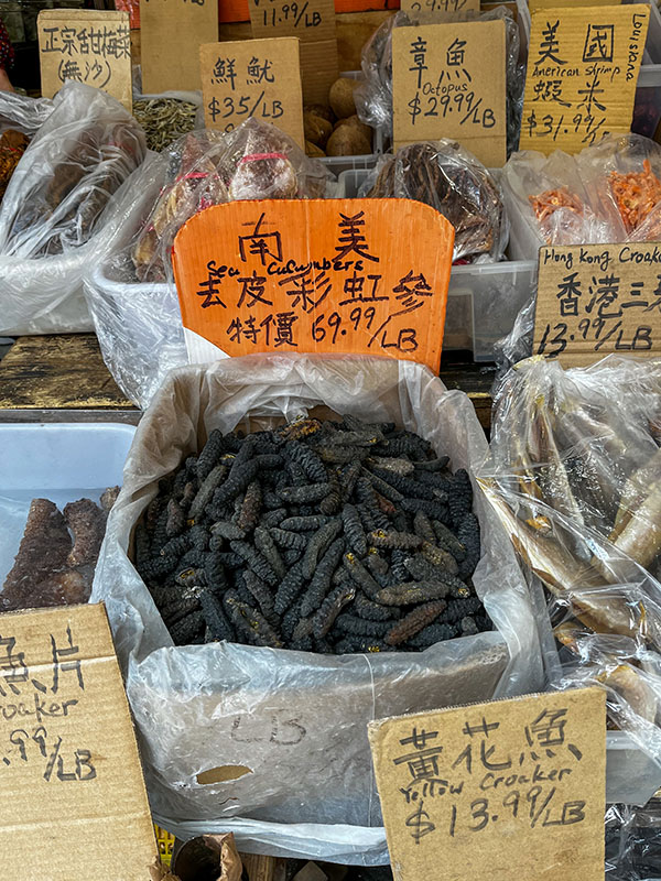 Dried sea cucumber Photograph of dried sea cucumbers with labels in Chinese characters plus prices.