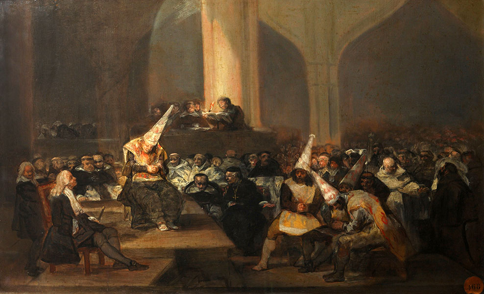 An auto de fé, or public accusation and penance, from the Spanish Inquisition. A dimly lit painting by Francisco Goya depicts hooded penitents in pointed caps standing accused before Inquisitors, while a crowd watches.